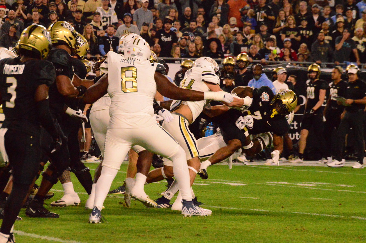 Georgia Tech tackling a UCF running back